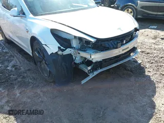 2020 Tesla Model 3 Long Range with VIN 5YJ3E1EB9LF735340, listed as a IAAI auction lot 41765919 with Not Provided miles. Bid and sale history available at carsss.com. Image 19.