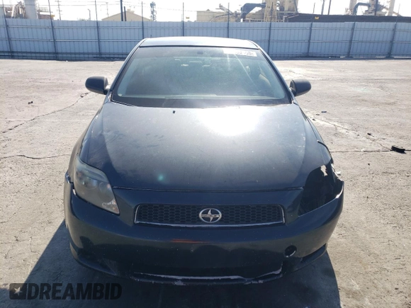 2006 Scion tC z VIN JTKDE177760134694, wystawiony jako Copart lot #43653465 z przebiegiem 245 961 mil mil oraz Szkoda całkowita • Salvage title. Historia ofert i sprzedaży dostępna na DreamBid. Obrazek 5.
