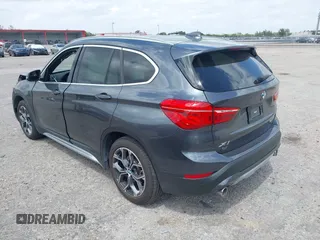 2022 BMW X1 sDrive28i with VIN WBXJG7C00N5U59675, listed as a IAAI auction lot 41915231 with 34,983 mi miles. Bid and sale history available at carsss.com. Image 3.