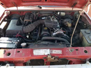 1989 Ford Ranger Splash with VIN 1FTCR10A2KUB58322, listed as a Copart auction lot 77710394 with 890,534 mi miles and Salvage Title. Bid and sale history available at DreamBid. Image 13.