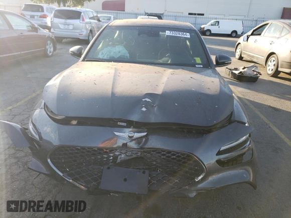 2023 Genesis G70 2.0T with VIN KMTG34TA1PU122906, listed as a Copart auction lot 73328364 with 11,439 mi miles and Salvage Title. Bid and sale history available at carsss.com. Image 5.