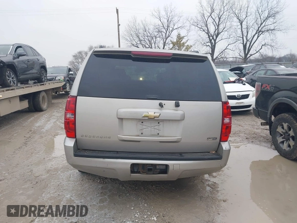 2009 Chevrolet Suburban LT with VIN 1GNFK16309R259972, listed as a IAAI auction lot 41568798 with 327,218 mi miles. Bid and sale history available at carsss.com. Image 16.