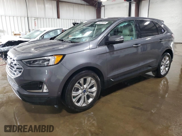 2021 Ford Edge Titanium with VIN 2FMPK4K96MBA38750, listed as a Copart auction lot 61401615 with 34,778 mi miles and Salvage title. Bid and sale history available at DreamBid. Image 1.