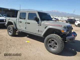 2022 Jeep Gladiator Rubicon z VIN 1C6JJTBG9NL101774, wystawiony jako Copart lot #74597074 z przebiegiem 11 903 mil mil oraz Szkoda całkowita • Salvage title. Historia ofert i sprzedaży dostępna na DreamBid. Obrazek 4.