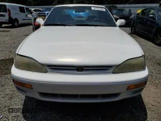 1995 Toyota Camry LE with VIN 4T1SK12E4SU878765, listed as a Copart auction lot 57761385 with 181,674 mi miles and Clean title. Bid and sale history available at DreamBid. Image 5.