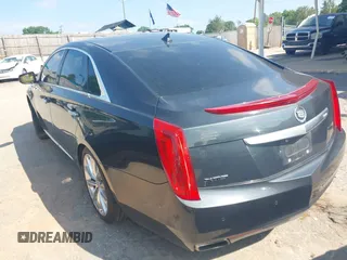2013 Cadillac XTS Luxury z VIN 2G61P5S37D9110658, wystawiony jako IAAI lot #42196442 z przebiegiem 182 228 mil mil oraz . Historia ofert i sprzedaży dostępna na DreamBid. Obrazek 3.