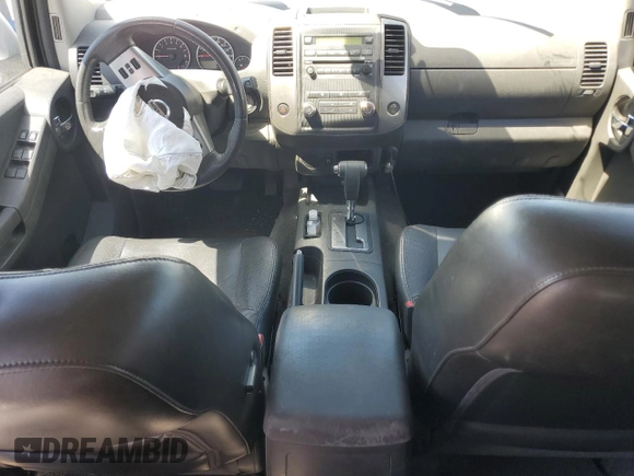 2010 Nissan Xterra S with VIN 5N1AN0NU2AC519838, listed as a Copart auction lot 57301355 with 129,990 mi miles and Salvage title. Bid and sale history available at DreamBid. Image 8.