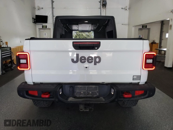 2020 Jeep Gladiator Rubicon with VIN 1C6JJTBG8LL121687, listed as a Copart auction lot 66404935 with 52,884 mi miles and Clean title. Bid and sale history available at DreamBid. Image 6.
