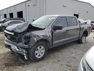 2023 Ford F-150 XL with VIN 1FTEW1EB0PKE65574, listed as a Copart auction lot 88522215 with 80,828 mi miles and Salvage Title. Bid and sale history available at carsss.com. Image 1.