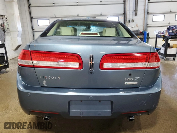 2011 Lincoln MKZ Hybrid z VIN 3LNDL2L33BR755653, wystawiony jako Copart lot #57050605 z przebiegiem 62 424 mil mil oraz Szkoda całkowita • Salvage title. Historia ofert i sprzedaży dostępna na DreamBid. Obrazek 6.