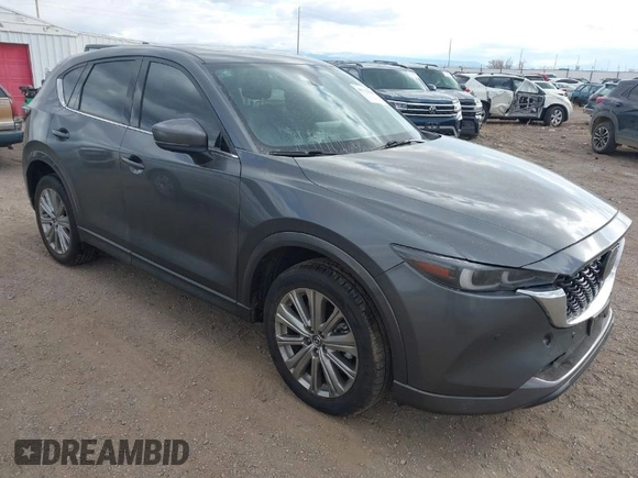 2023 Mazda CX-5 Signature with VIN JM3KFBXY9P0102087, listed as a IAAI auction lot 41771949 with 35,610 mi miles and . Bid and sale history available at carsss.com. Image 1.
