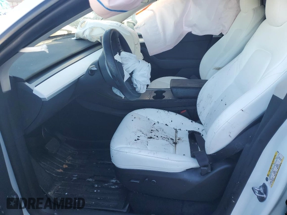 2023 Tesla Model Y Long Range z VIN 7SAYGAEE1PF810888, wystawiony jako Copart lot #88991735 z przebiegiem Nie podano mil oraz Nie do naprawy • Non repairable. Historia ofert i sprzedaży dostępna na DreamBid. Obrazek 7.