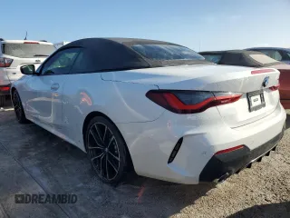2022 BMW 4 Series 430i with VIN WBA23AT02NCJ38076, listed as a Copart auction lot 76186884 with 21,106 mi miles and Non repairable. Bid and sale history available at DreamBid. Image 2.