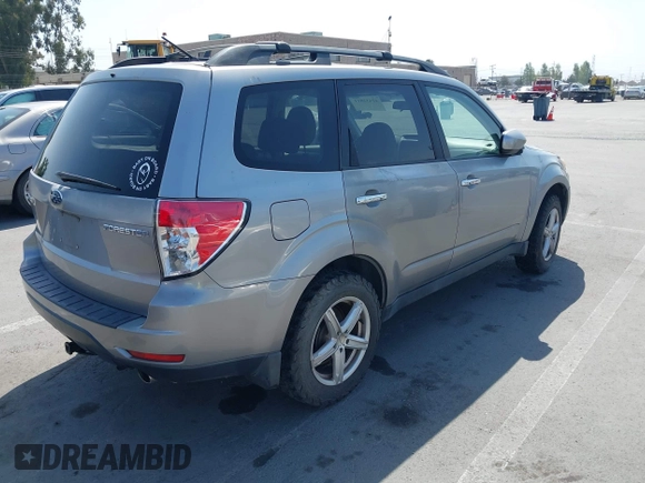 2009 Subaru Forester X with VIN JF2SH63669H716034, listed as a IAAI auction lot 42432811 with 192,094 mi miles and . Bid and sale history available at DreamBid. Image 4.