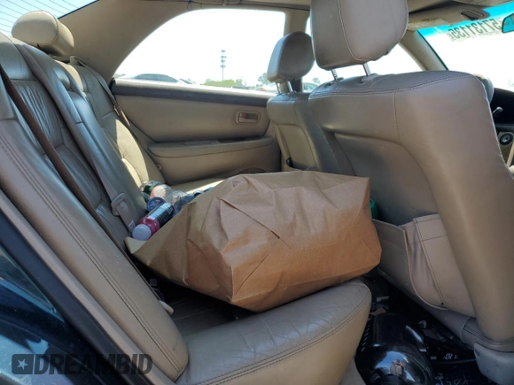 1998 Lexus ES 300 с VIN JT8BF28G5W0134403, выставлен на аукционе Copart как лот 57131135 с пробегом 281 827 миль миль и Списание • Salvage title. История ставок и продаж доступна на DreamBid. Изображение 10.