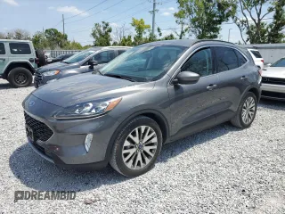 2021 Ford Escape Titanium Hybrid z VIN 1FMCU0DZ4MUA82674, wystawiony jako Copart lot #54162755 z przebiegiem 84 874 mil mil oraz Nie do naprawy • Non repairable. Historia ofert i sprzedaży dostępna na DreamBid. Obrazek 1.