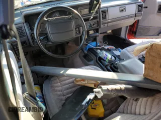 1994 Jeep Grand Cherokee Laredo с VIN 1J4GZ58S1RC119463, выставлен на аукционе Copart как лот 48240315 с пробегом 126 826 миль миль и Списание • Salvage title. История ставок и продаж доступна на DreamBid. Изображение 8.