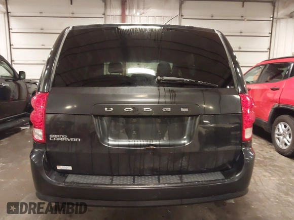 2015 Dodge Grand Caravan SXT with VIN 2C4RDGCG8FR518739, listed as a IAAI auction lot 41704911 with 278,478 mi miles and . Bid and sale history available at DreamBid. Image 17.