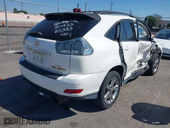 2006 Lexus RX 400h with VIN JTJHW31U160005783, listed as a IAAI auction lot 41878471 with 157,087 mi miles and . Bid and sale history available at DreamBid. Image 4.
