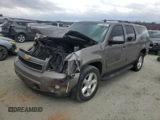 2013 Chevrolet Suburban LT with VIN 1GNSCJE00DR113972, listed as a Copart auction lot 47790575 with 210,454 mi miles and Salvage Title. Bid and sale history available at carsss.com. Image 1.