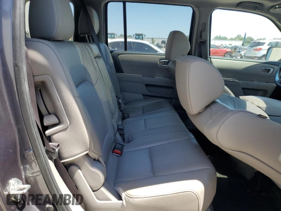 2015 Honda Pilot EX-L z VIN 5FNYF3H56FB004678, wystawiony jako Copart lot #53376705 z przebiegiem 117 910 mil mil oraz Szkoda całkowita • Salvage title. Historia ofert i sprzedaży dostępna na DreamBid. Obrazek 11.