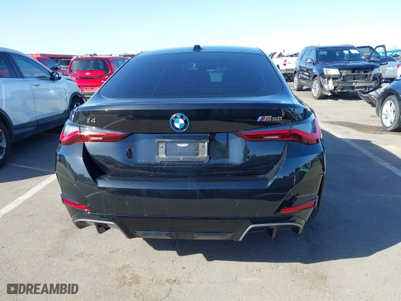 2023 BMW i4 M50 with VIN WBY33AW08PFP07600, listed as a IAAI auction lot 41766627 with 13,656 mi miles. Bid and sale history available at carsss.com. Image 16.