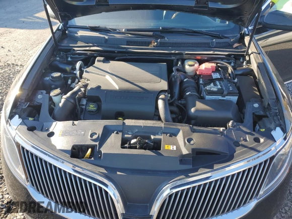 2014 Lincoln MKS EcoBoost with VIN 1LNHL9FT2EG600500, listed as a Copart auction lot 83764694 with 74,949 mi miles and Salvage title. Bid and sale history available at DreamBid. Image 11.
