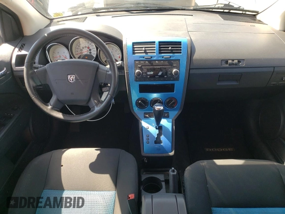 2009 Dodge Caliber R/T z VIN 1B3HB78B49D168677, wystawiony jako Copart lot #58051655 z przebiegiem 104 860 mil mil oraz Szkoda całkowita • Salvage title. Historia ofert i sprzedaży dostępna na DreamBid. Obrazek 8.