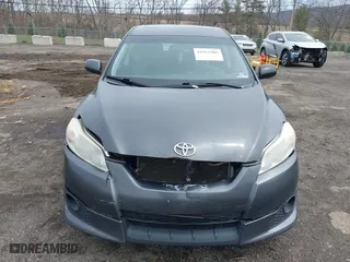 2009 Toyota Matrix S with VIN 2T1LE40E99C004133, listed as a IAAI auction lot 41917906 with 213,996 mi miles. Bid and sale history available at carsss.com. Image 6.