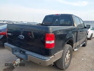 2004 Ford F-150 XLT with VIN 1FTPW14554KC93459, listed as a IAAI auction lot 41673091 with 239,519 mi miles. Bid and sale history available at carsss.com. Image 4.