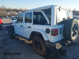 2021 Jeep Wrangler Unlimited Sahara with VIN 1C4HJXEG1MW597905, listed as a IAAI auction lot 41327138 with Not provided miles and . Bid and sale history available at DreamBid. Image 3.