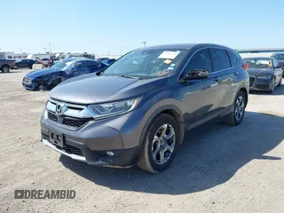 2019 Honda CR-V EX with VIN 5J6RW1H58KA042502, listed as a IAAI auction lot 42001700 with 117,396 mi miles and . Bid and sale history available at DreamBid. Image 17.