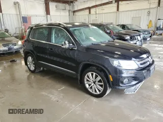 2013 Volkswagen Tiguan S with VIN WVGAV3AX1DW602083, listed as a Copart auction lot 57977515 with 114,375 mi miles and Clean title. Bid and sale history available at DreamBid. Image 4.