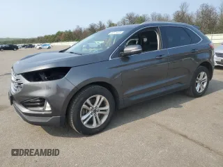 2019 Ford Edge SEL z VIN 2FMPK4J9XKBC67141, wystawiony jako Copart lot #60271615 z przebiegiem 100 400 mil mil oraz Szkoda całkowita • Salvage title. Historia ofert i sprzedaży dostępna na DreamBid. Obrazek 1.