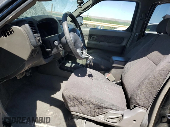2001 Nissan Xterra XE with VIN 5N1ED28T01C522269, listed as a Copart auction lot 56997515 with 103,800 mi miles and Salvage title. Bid and sale history available at DreamBid. Image 7.