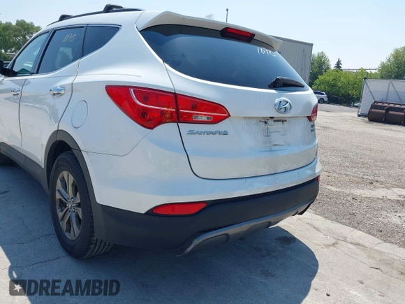 2014 Hyundai Santa Fe with VIN 5XYZUDLB9EG156555, listed as a IAAI auction lot 42721070 with 349,412 mi miles and . Bid and sale history available at DreamBid. Image 6.