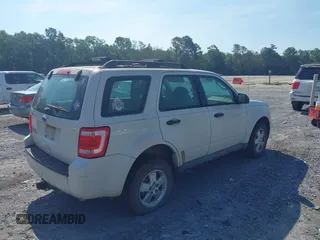 2012 Ford Escape XLS with VIN 1FMCU0C77CKC51709, listed as a IAAI auction lot 42847290 with 218,175 mi miles and . Bid and sale history available at DreamBid. Image 4.