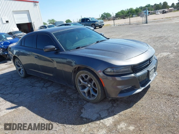 2015 Dodge Charger SXT with VIN 2C3CDXHG9FH825135, listed as a IAAI auction lot 42172793 with 169,324 mi miles and . Bid and sale history available at DreamBid. Image 13.