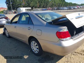 2006 Toyota Camry STD z VIN 4T1BE30K06U126692, wystawiony jako IAAI lot #42335766 z przebiegiem 74 000 mil mil oraz . Historia ofert i sprzedaży dostępna na DreamBid. Obrazek 3.