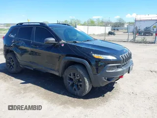 2018 Jeep Cherokee Trailhawk Leather Plus with VIN 1C4PJMBXXJD572667, listed as a IAAI auction lot 42216477 with 85,890 mi miles and . Bid and sale history available at DreamBid. Image 1.