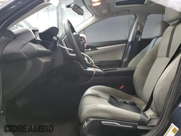 2018 Honda Civic EX с VIN 19XFC2F77JE040070, выставлен на аукционе Copart как лот 56895195 с пробегом 39 746 миль миль и Списание • Salvage title. История ставок и продаж доступна на DreamBid. Изображение 7.