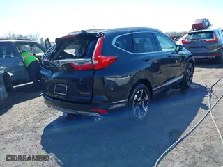 2019 Honda CR-V Touring with VIN 2HKRW1H96KH505447, listed as a IAAI auction lot 41876110 with 56,104 mi miles. Bid and sale history available at carsss.com. Image 4.