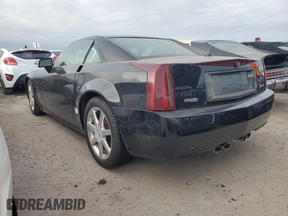 2005 Cadillac XLR z VIN 1G6YV34A955600425, wystawiony jako Copart lot #76188034 z przebiegiem Nie podano mil oraz Szkody całkowita. Historia ofert i sprzedaży dostępna na DreamBid. Obrazek 2.