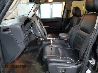 2010 Jeep Commander Sport z VIN 1J4RG4GK5AC153002, wystawiony jako Copart lot #43247725 z przebiegiem 189 879 mil mil oraz Czysty tytuł • Clean title. Historia ofert i sprzedaży dostępna na DreamBid. Obrazek 7.