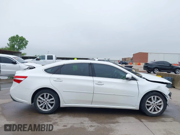 2014 Toyota Avalon Limited z VIN 4T1BK1EB6EU098479, wystawiony jako IAAI lot #42171736 z przebiegiem 92 290 mil mil oraz . Historia ofert i sprzedaży dostępna na DreamBid. Obrazek 14.