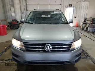 2020 Volkswagen Tiguan SE z VIN 3VV3B7AX2LM075653, wystawiony jako Copart lot #54601595 z przebiegiem 132 879 mil mil oraz Szkody całkowita. Historia ofert i sprzedaży dostępna na DreamBid. Obrazek 5.