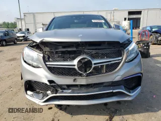 2016 Mercedes-Benz GLE 63 S AMG z VIN 4JGED7FBXGA012667, wystawiony jako Copart lot #57424895 z przebiegiem 94 245 mil mil oraz Szkoda całkowita • Salvage title. Historia ofert i sprzedaży dostępna na DreamBid. Obrazek 5.