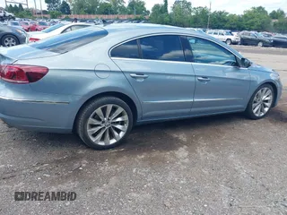 2013 Volkswagen CC Executive z VIN WVWGU7AN3DE524175, wystawiony jako IAAI lot #42401952 z przebiegiem 165 023 mil mil oraz . Historia ofert i sprzedaży dostępna na DreamBid. Obrazek 4.
