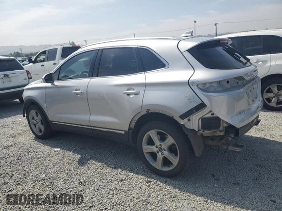 2017 Lincoln MKC Premiere z VIN 5LMCJ1C95HUL11303, wystawiony jako Copart lot #58263945 z przebiegiem 82 628 mil mil oraz Szkoda całkowita • Salvage title. Historia ofert i sprzedaży dostępna na DreamBid. Obrazek 2.