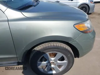 2009 Hyundai Santa Fe Limited with VIN 5NMSH13E79H313431, listed as a IAAI auction lot 42463227 with 153,784 mi miles and . Bid and sale history available at DreamBid. Image 15.